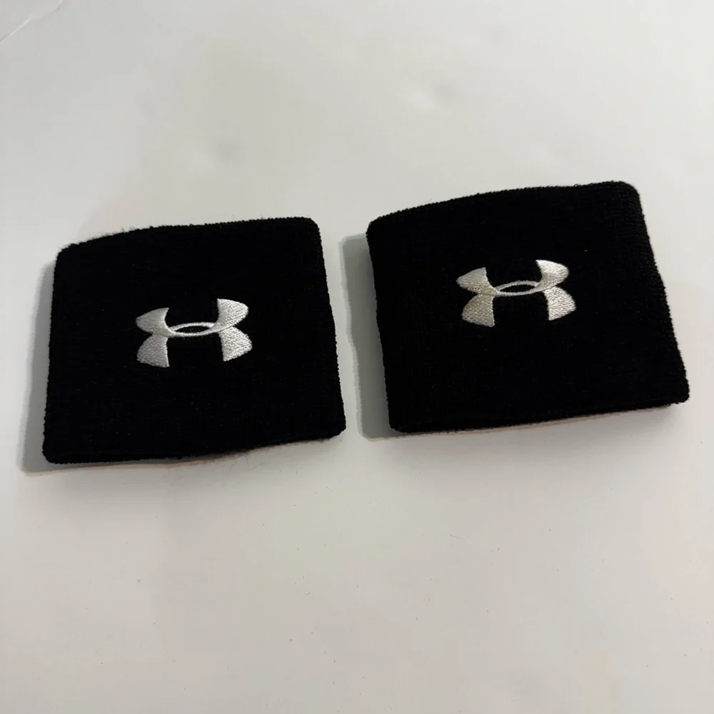 NWOT Under Armour Black Wristbands with White Embroidered Logo